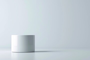 Against a neutral background, a cylindrical 3D podium stands out, offering a focal point for product placement or marketing messages. The ample copyspace ensures that the design remains uncluttered