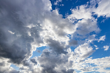 The sky is cloudy and the sun is shining through the clouds