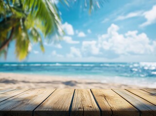 Empty wooden table top with blurred ocean beach background.