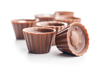 Sweet pralines. Chocolate truffles isolated on white background.
