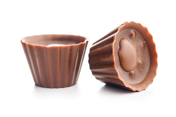 Sweet pralines. Chocolate truffles isolated on white background.