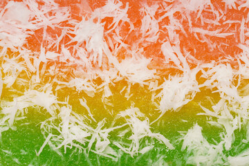 Sentiling, or Lapis Singkong, is a sweet Indonesian snack made from cassava, colored red, yellow,...