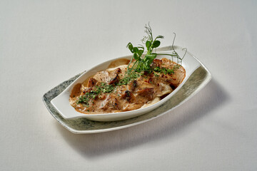 A steaming bowl of traditional Ukrainian varenyky