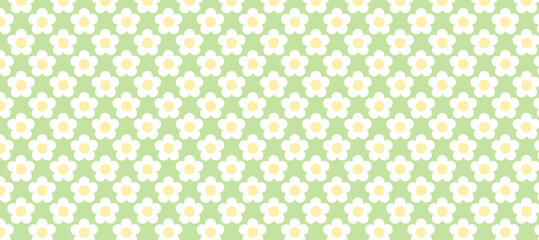 Seamless pattern with flowers in the  green background
