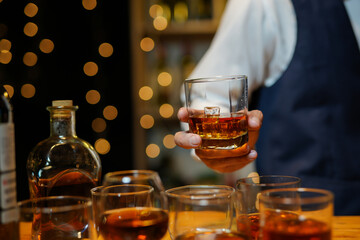 Bartender Serve Whiskey, on wood bar, 