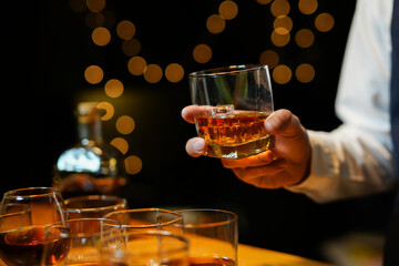 Bartender Serve Whiskey, on wood bar, 