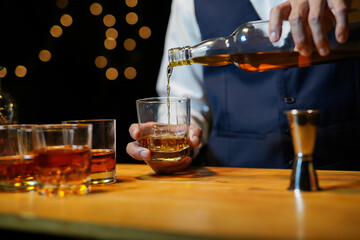 Bartender Serve Whiskey, on wood bar, 