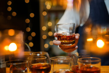 Bartender Serve Whiskey, on wood bar, 