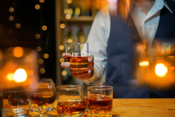 Bartender Serve Whiskey, on wood bar, 