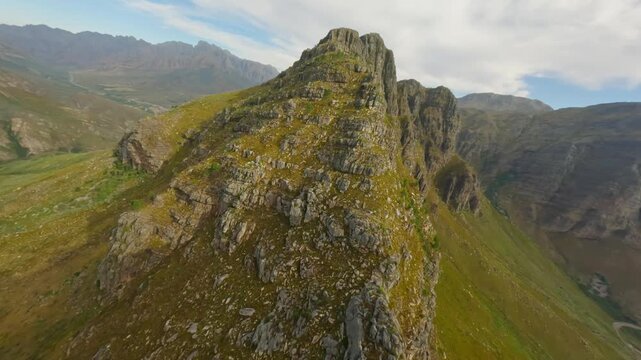 Drone flying towards the mountain top at the Du Toits Kloof near Cape Town.