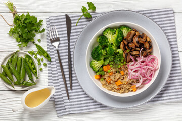 quinoa with veggies and mushrooms in a bowl