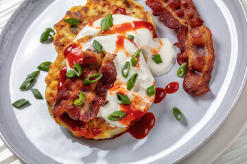 tasty cheese sweet corn pancakes with fried bacon
