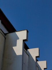 Abstract Face of Rooftop: Exploring Light, Shadow, Pattern, and Texture in Building Architecture.
