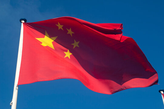 General stock - Chinese flag fluttering in the wind.