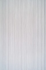 ミニマリズムな縦の白いラインパターンの縦画像