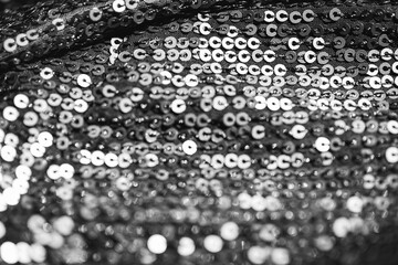 Abstract composition of fabric with shiny sequins. Holiday and party concept