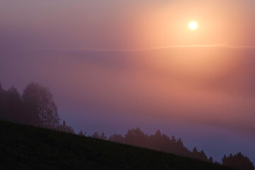 sunrise from behind the clouds