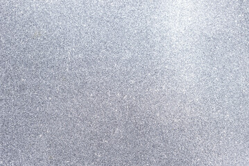 Abstract silver glitter background, blank shiny glitter background, selective focus