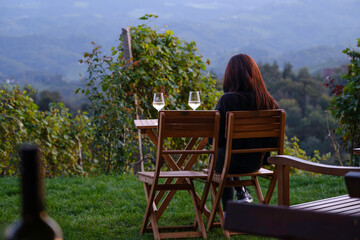 girl sitting with a glass of wine waiting for you