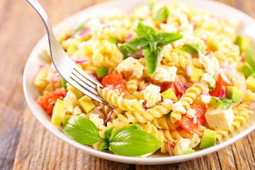 bowl of pasta salad and fork
