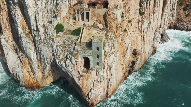 Aerial View of Porto Flavia: Historic Mining Port in Sardinia, Italy, Captured in Spring.