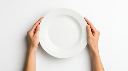Hands holding an empty white plate on a white background.