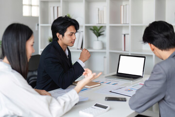 Business Team Collaborating in Modern Office, Exchanging Ideas and Strategies for Work Projects