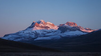 Majestic snow-capped Mount Hood stands tall, a pristine peak amidst a panoramic winter wonderland
