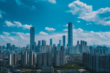 Fototapeta premium Skyscrapers Viewed from Below with Blue Sky and White Clouds