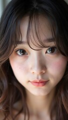 Fototapeta premium Close-up Portraits of a Young Woman with Natural Makeup, Soft Lighting, and Serene Expressions Highlighting Flawless Skin and Captivating Eyes in Various Angles