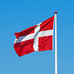 Denmark, flag and wind on sky background in summer, pride and protocol at kingdom. Symbol, nationalism and international identification in Scandinavia with royalty, representation and mockup space