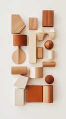 Obraz premium Wooden geometric shapes forming abstract composition on white background
