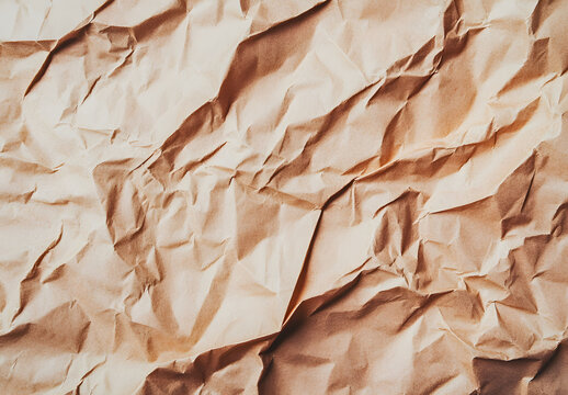 Abstract crumpled and creased recycle brown paper texture background