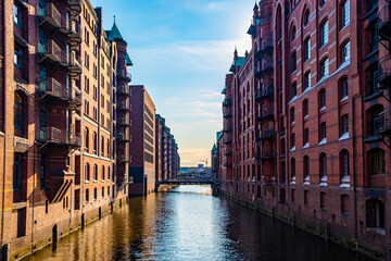 European city street on the river bank and the clear sky above in the Northern  Germany. 