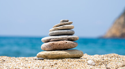 Stones balance on beach, zen concept