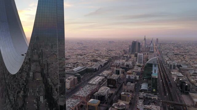 Drone shot flying. Saudi Arabia. Riyadh. Kingdom tower. Sunrise.