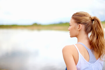 Memory, thinking and back of woman by lake for inner peace, aura cleanse and connection to nature. Zen, person and relax with reflection by water for mental health, mindfulness and holistic healing