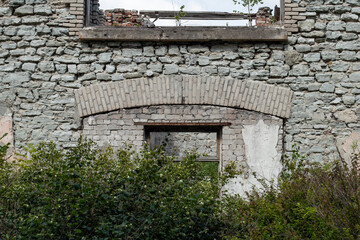 Old abandoned and deserted, half demolished house ruins in Viivikonna, Estonia