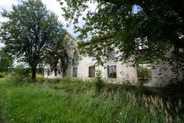 Old abandoned and deserted, half demolished house ruins in Viivikonna, Estonia
