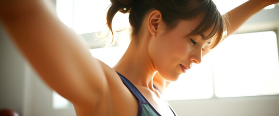 Young Woman Stretching in the Light