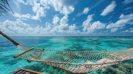 Obraz premium Tropical Hammock Over Crystal Clear Water