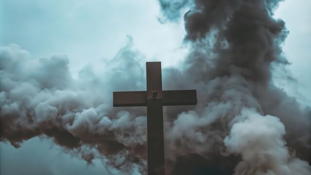 A Wooden Cross Against a Background of Smoke and Clouds
