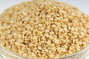 Urad Dal or Urad Bean or Black Gram (Vigna Mungo) Dry Split Urad Beans polished close up shot,...