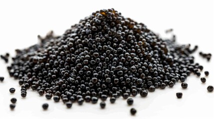 Naklejka premium Close-up image of a pile of black peppercorns for cooking and seasoning use.