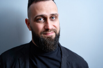 Fototapeta premium Studio portrait of young handsome man with beard.