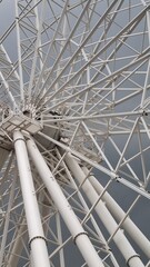 White ferris wheel in cloudy weather