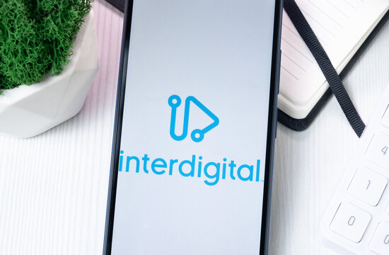 New York, USA - 10 August 2024: InterDigital Logo on Phone Screen, Company Icon on Display