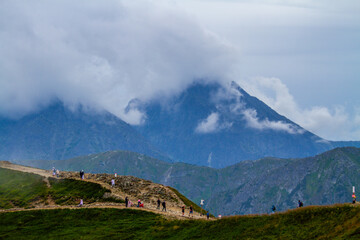Beautiful mountain landscape with clouds and fog. 