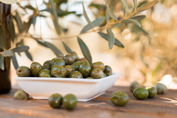 Olives on table in an olive grove