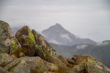 Beautiful mountain landscape with clouds and fog. 